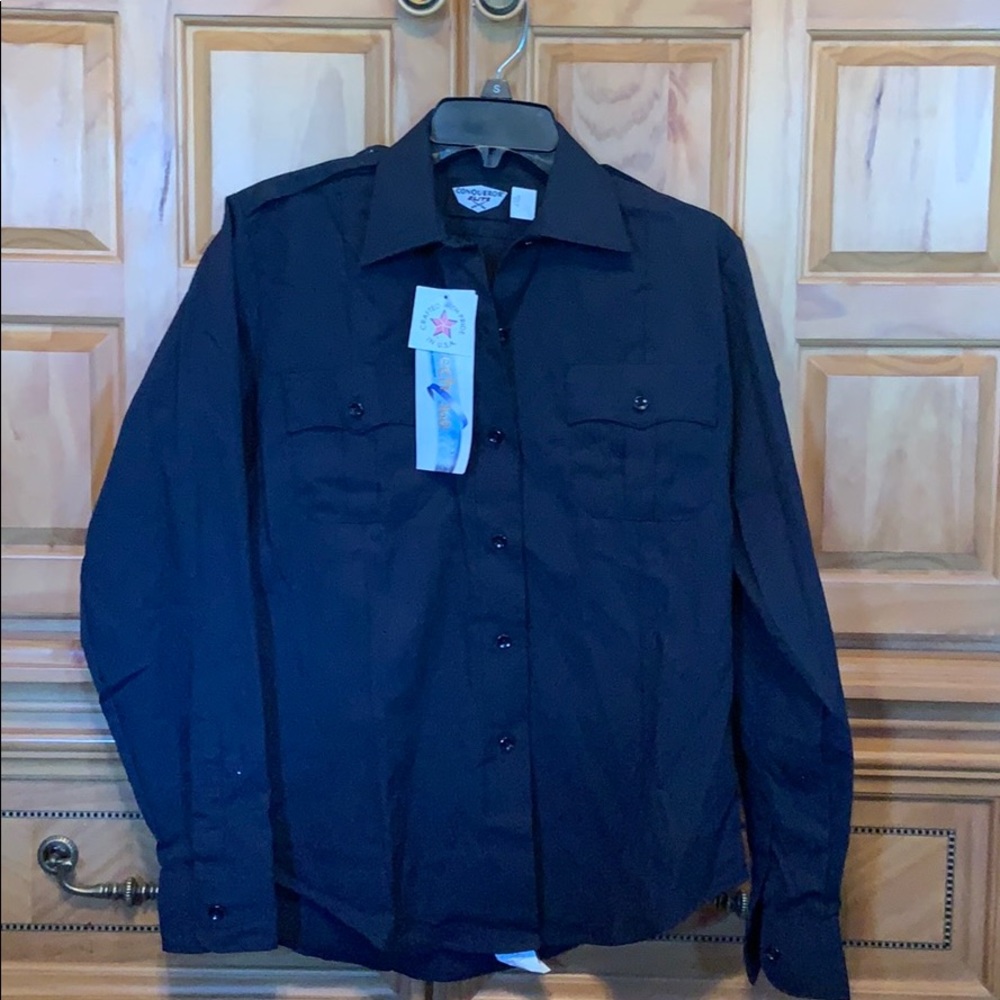 Women’s navy blue long sleeve police/EMS shirt.